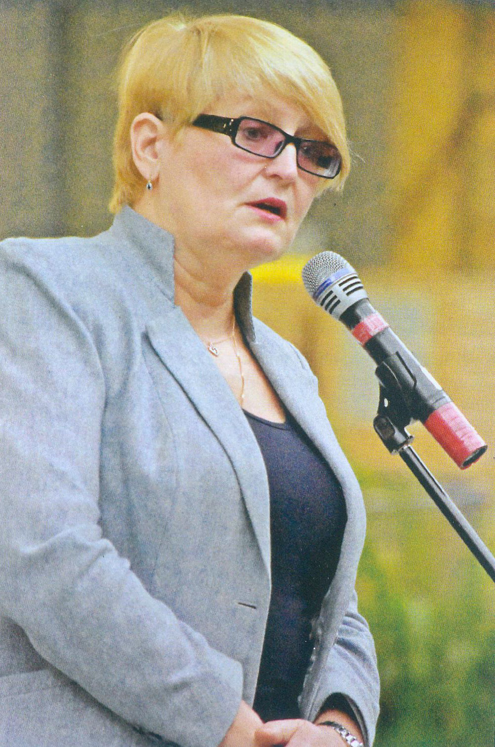 Т.В. Кузьмініч на прэзентацыі інфармацыйных рэсурсаў Віртуальнай чытальнай залы НББ. Крыніца ілюстрацыі: Таццяна Васільеўна Кузьмініч : біябібліяграфічны паказальнік / Нацыянальная бібліятэка Беларусі, Аддзел даведачна-інфармацыйнага абслугоўвання ; [складальнікі: Т. Я. Васільева і інш. ; рэдактар А. Е. Далгаполава ; рэдактар бібліяграфічных запісаў А. Ю. Талкачова ; аўтары прадмовы і ўступнага артыкула: А. Е. Далгаполава, А. В. Тулупава]. – 2-е выд., перапрацаванае і дапоўненае. – Мінск, 2020. – С. 16 уклейкі паміж с. 30–31.