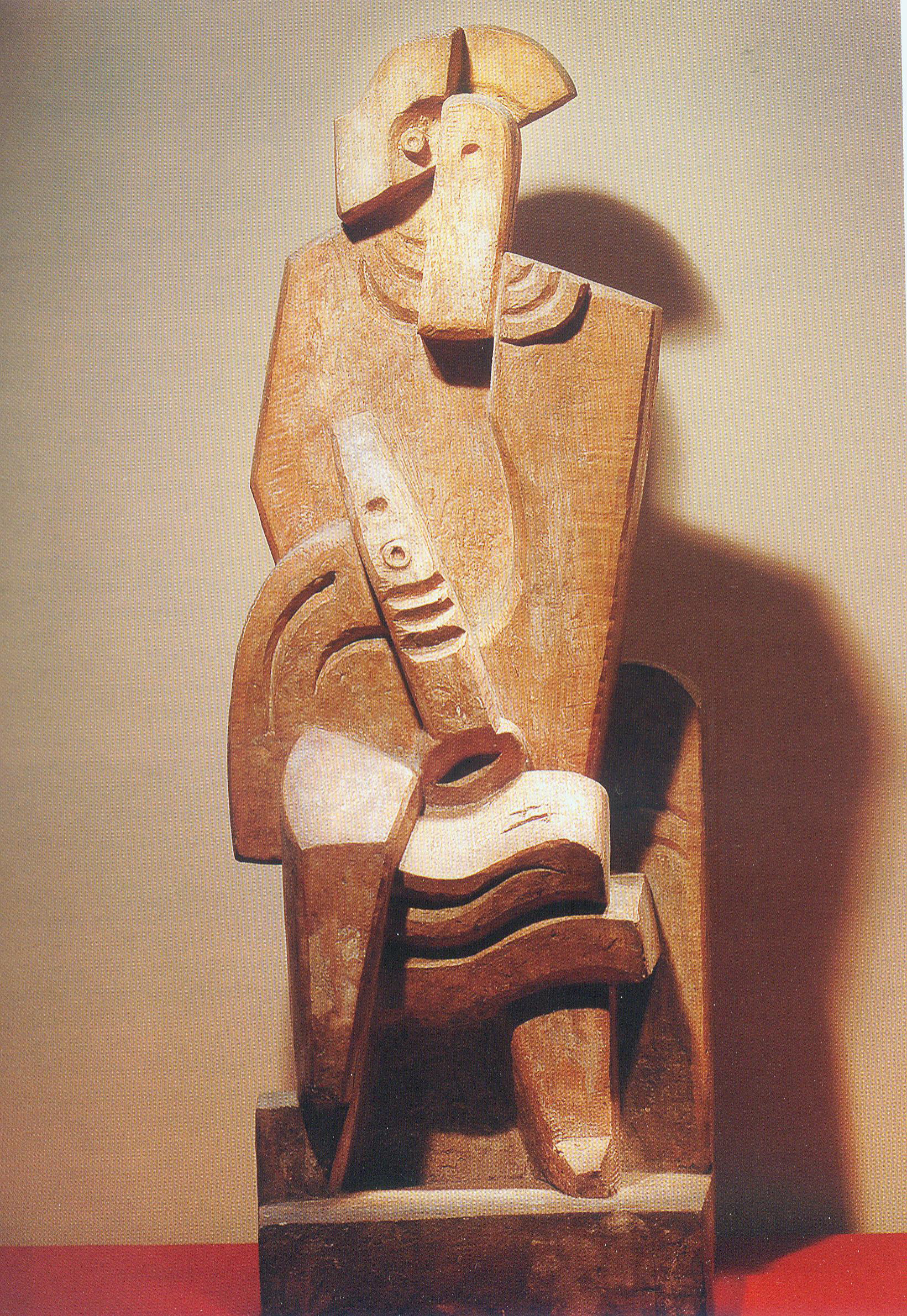 Сидящий арлекин с кларнетом (1919–1920). Источник иллюстрации: Третьяковская галерея = The Tretyakov gallery magazine. – 2006. – № 1. – С. 78.