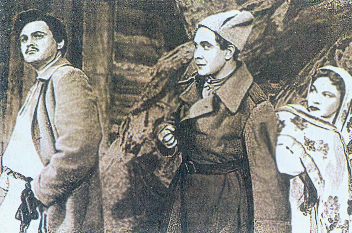 Анатоль Генералаў (злева) у ролі Змітрака ў оперы "Міхась Падгорны" Я. Цікоцкага. Крыніца ілюстрацыі: Тэатральная Беларусь : энцыклапедыя : у 2 т. / [пад агульнай рэдакцыяй А. В. Сабалеўскага]. – Мінск, 2002. – Т. 1 : А–К / [рэдкалегія: Г. П. Пашкоў (галоўны рэдактар) і інш.]. – С. 258.