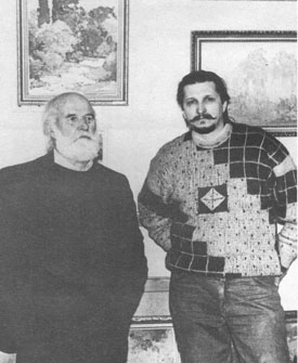 Павел Васільевіч Масленікаў з сынам Уладзімірам у майстэрні (1984). Крыніца ілюстрацыі:Павел Масленікаў : [1914–1995 народны мастак Беларусі : альбом / аўтар і кіраўнік праекта Уладзімір Пракапцоў; складальнікі: Вера Пракапцова і інш. – Мінск, 1996. –  [С. 15].