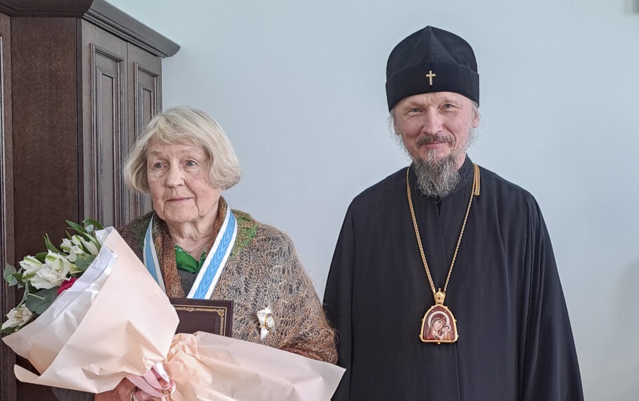 Валянціна Анатольеўна з мітрапалітам Веніямінам падчас уручэння ордэна Святой Роўнаапостальнай вялікай княгіні Вольгі II ступені. 31.01.2026. Крыніца ілюстрацыі: http://church.by/news/patriarshij-ekzarh-vozglavil-zasedanie-uchenogo-soveta-minskoj-duhovnoj-akademii-12